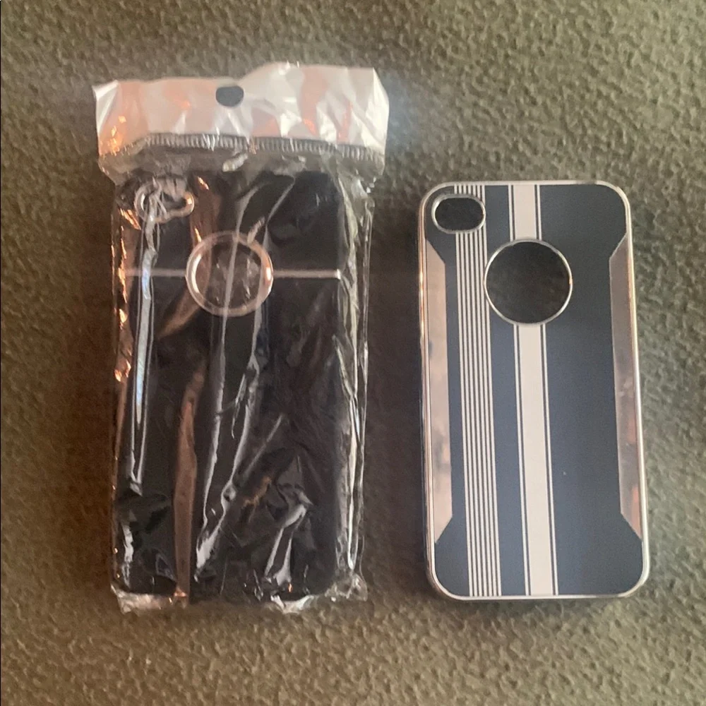 NIP black and silver phone cover and one GUC black and silver phone cover.